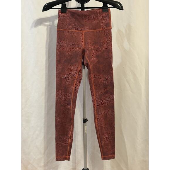 Lululemon Pants - Lululemon Wunder Train High Rise Tights Crackle Glaze Orange Women's size 6